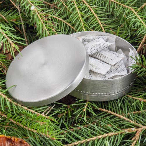 Snusdosa med dekor tenn